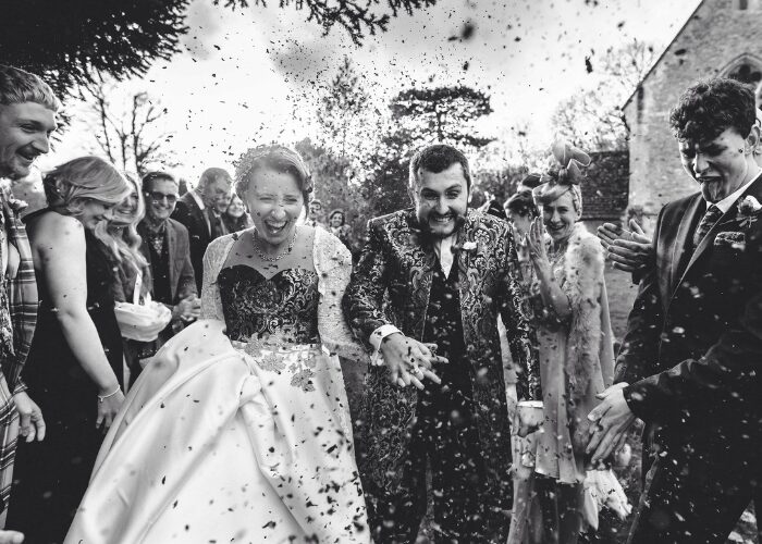 Amy wearing her three piece upcycled gown design with her vintage grandmothers lace and inherited alencon lace features.
