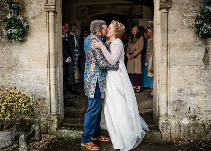 Real bride Amy bride on her wedding day wearing her heirloom upcycled wedding dress