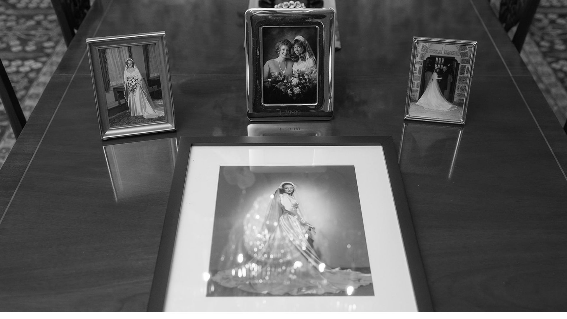 collection of photos showing the brides grandmother, mother and aunt wearing the original dress