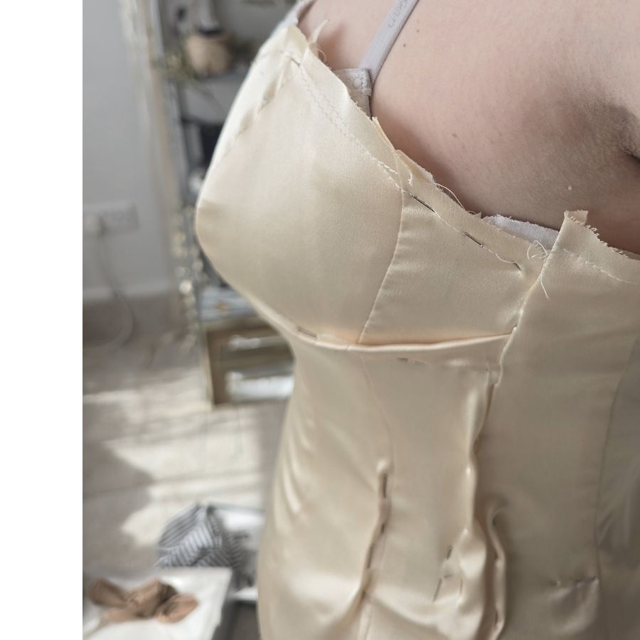 Behind the scenes, internal corset construction process for heirloom wedding gown